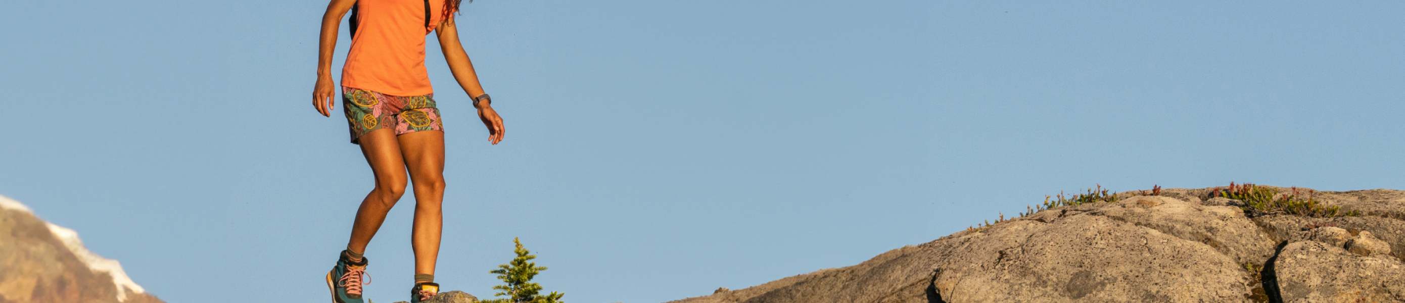 Woman running in Smartwool bottoms